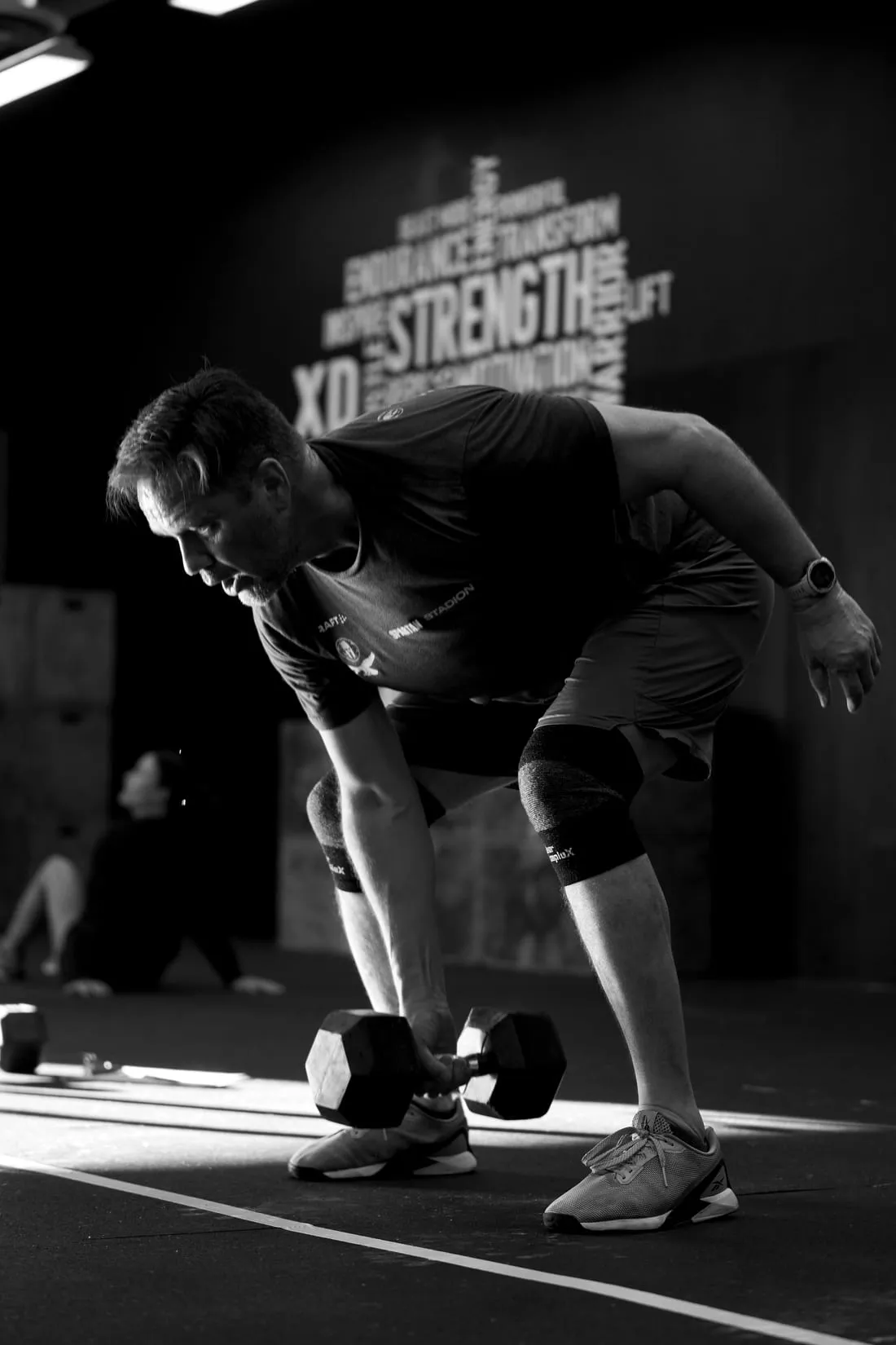 Members training together in a group strength class at XD FIT